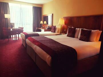 Фото номера Стандартный трехместный номер Отель Glashaus Hotel г. Талла 3
