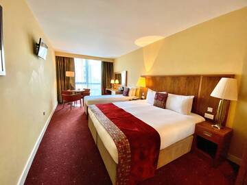 Фото номера Стандартный трехместный номер Отель Glashaus Hotel г. Талла 2