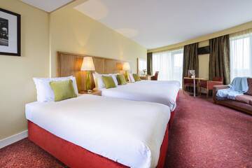 Фото номера Стандартный семейный номер Отель Glashaus Hotel г. Талла 5